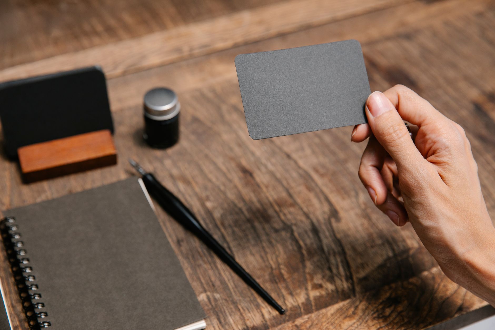 Blank sample cards on a wooden tabletop